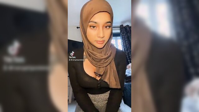 Yasmina Khan\'s hijab-clad tits get oiled up in TikTok video