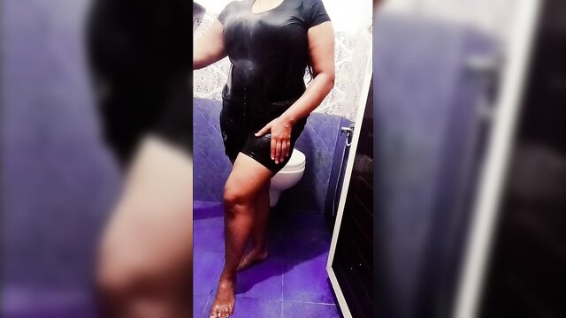 Desi babe Arya shows off her huge boobs in a steamy bathroom scene