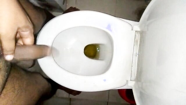 Watch a black man cum while urinating in this hardcore video