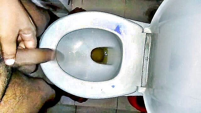 Watch a black man cum while urinating in this hardcore video