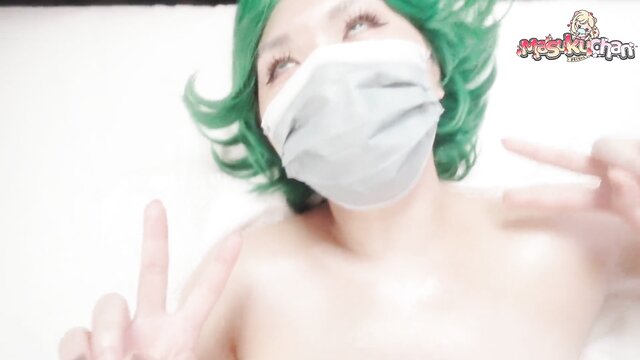 Tatsumaki enjoys a sensual oil massage and a hot squirt session in this video