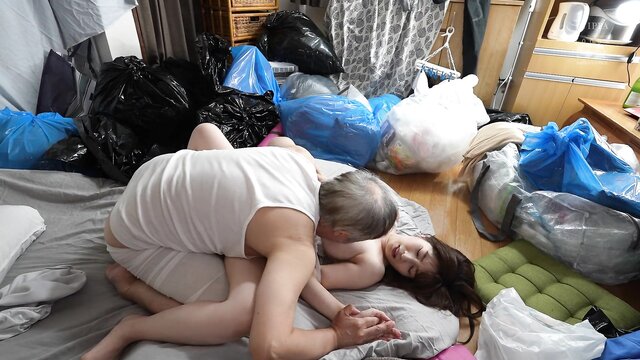 Japanese pornstar Okada__ Suzu gets naughty in a room full of dirty junk