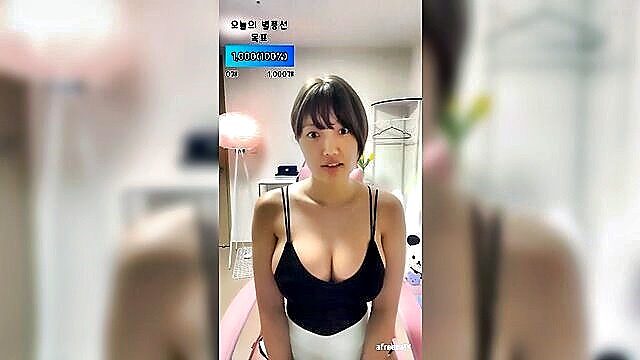 Korean amateur with big tits gives a blowjob