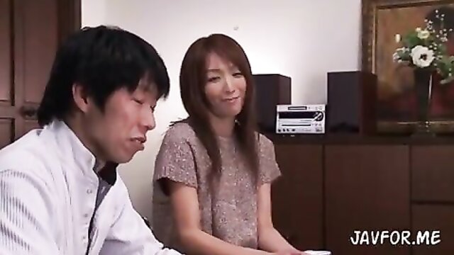 Japanese beauty gives a blowjob and gets fucked from behind