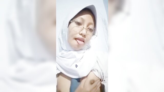 Young hijab-clad amateur with small tits gets naughty in hijab uniform
