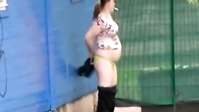 Amateur video captures pregnant woman peeing in public