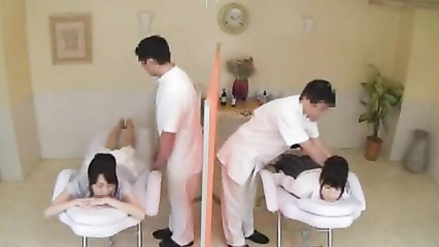Three generations of women indulge in an oil massage