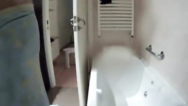 Hidden camera captures a naked couple showering, with no sexy encounter in the bathroom